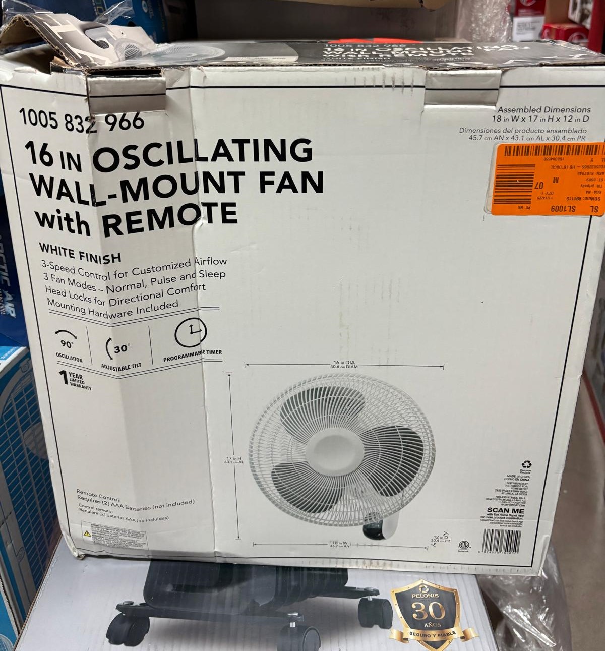 16-inch oscillating wall-mount fan with a remote control